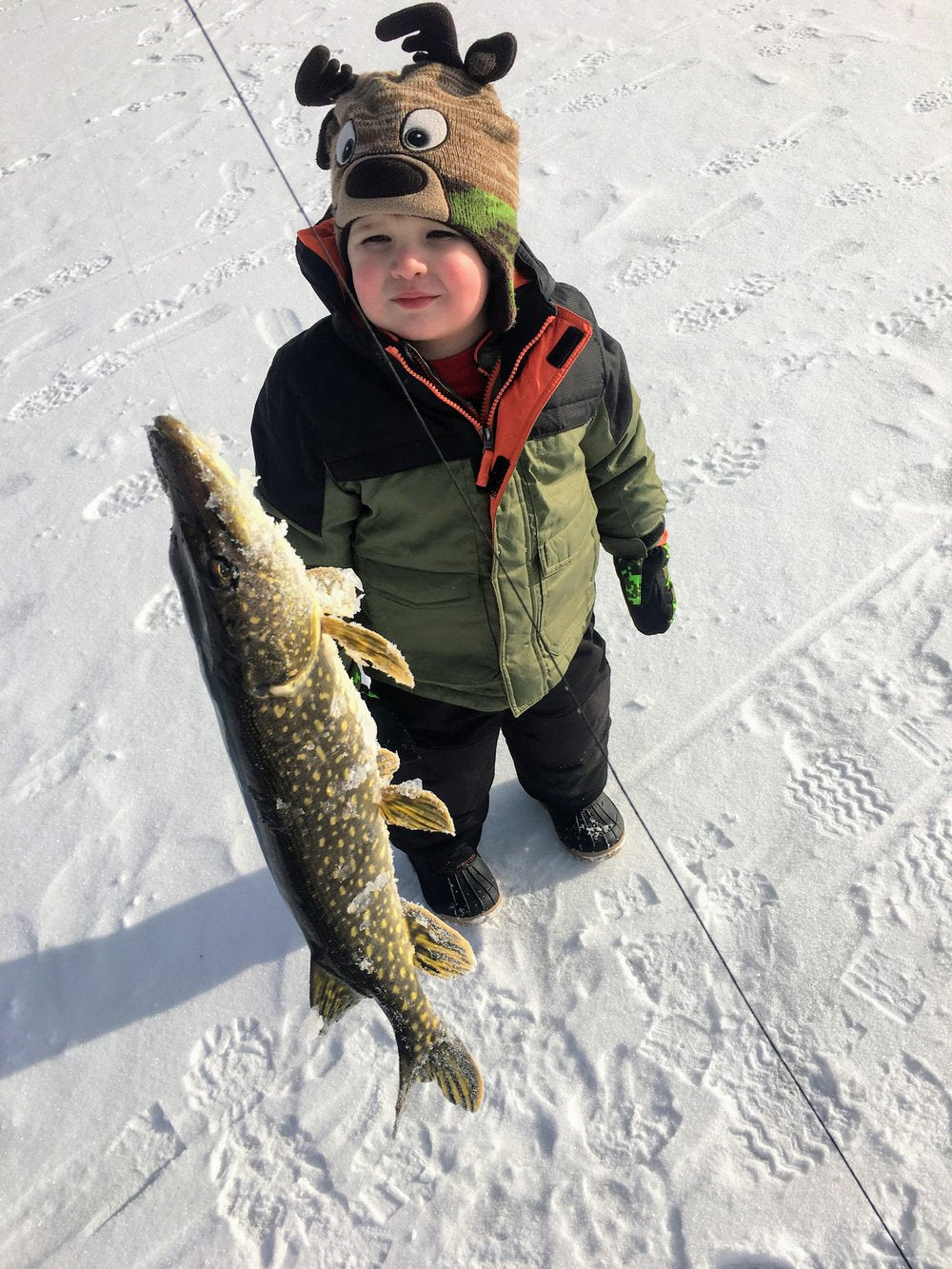 northern pike ice fishing kid