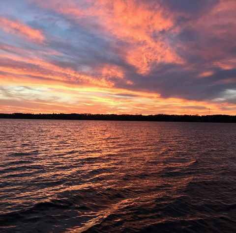 presque isle mi sunset over the lake