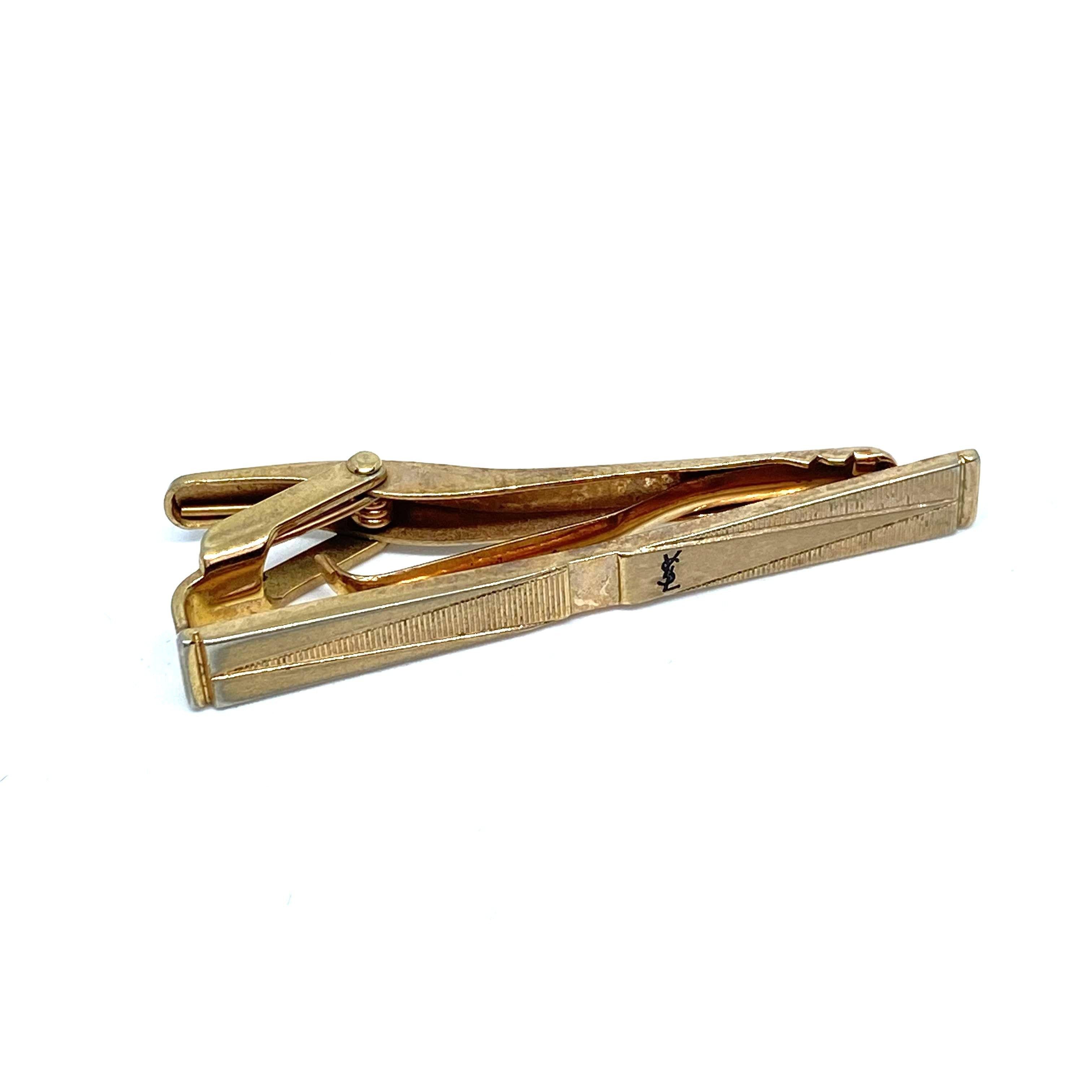 ysl tie bar