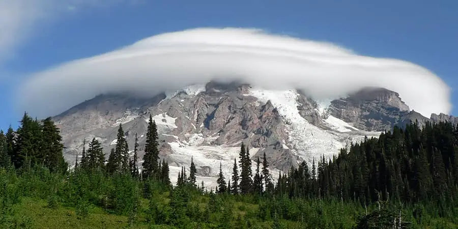 mount rainier national park image of mountain with cloud formation around peek