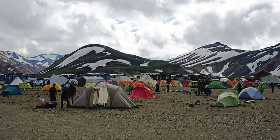 large group coming together for outdoor camping