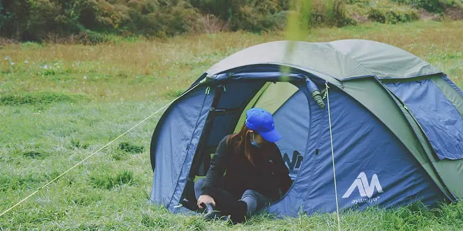 Woman in an Ayamaya pop up tent