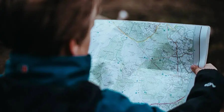 Choose a hiking route on a topographical map