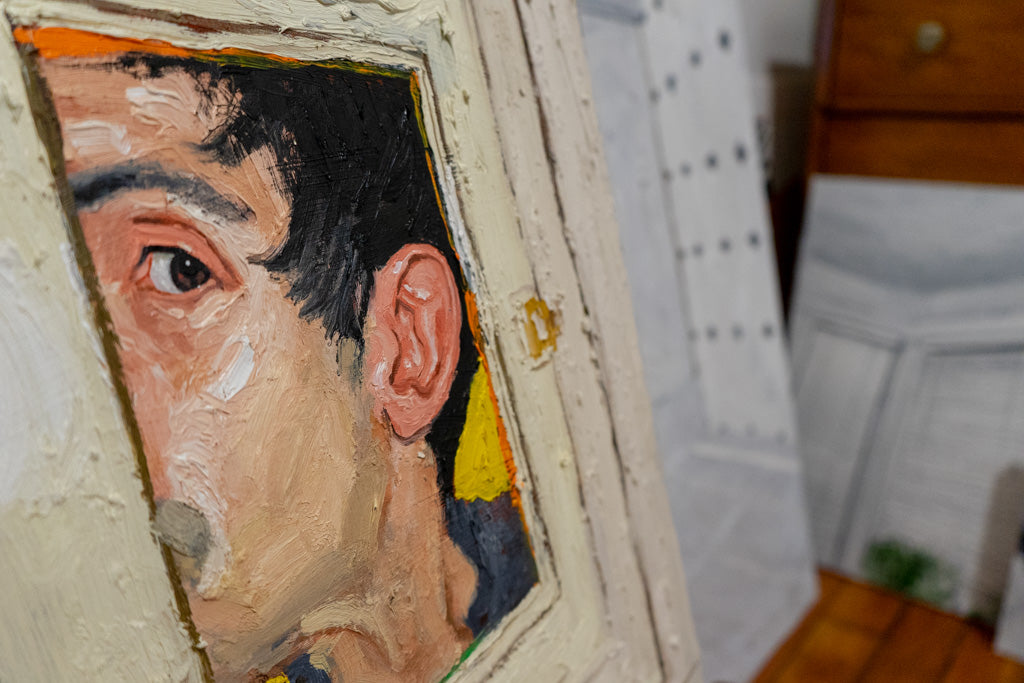 Emilio Villalba's studio with self-portrait