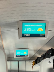 Colour photo of a Eurostar screen showing a speed of 285 km / hour