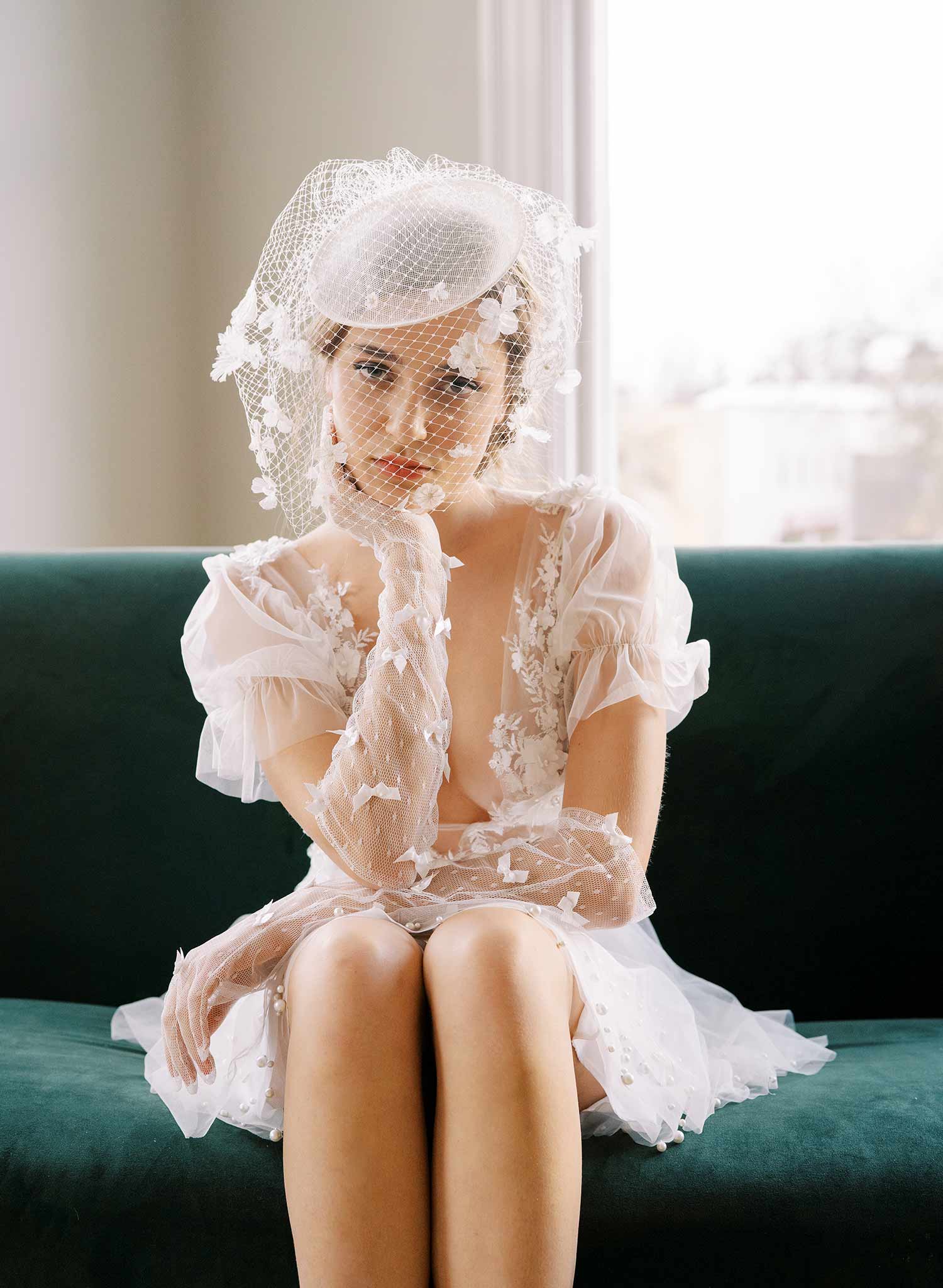 bridal hat with birdcage veil and flowers by twigs and honey