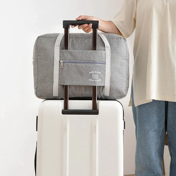 Faltbare Reisehandtasche. Kaufen Sie Handtaschen auf Mounteen. Weltweiter Versand möglich.