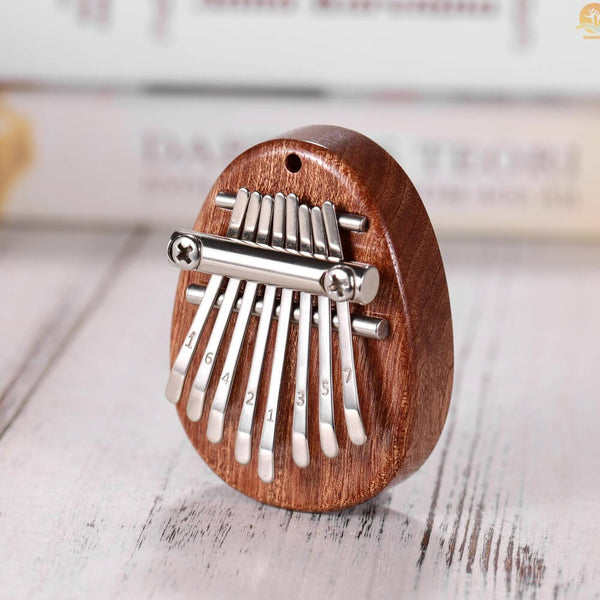 Entspannendes Mini-Kalimba-Daumenklavier mit 8 Tasten. Kaufen Sie Musikinstrumente auf Mounteen. Weltweiter Versand möglich.