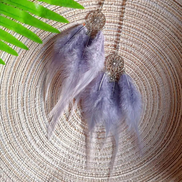 Hanging Dreamcatcher Feather Ornament. Shop Dreamcatchers on Mounteen. Worldwide shipping available.