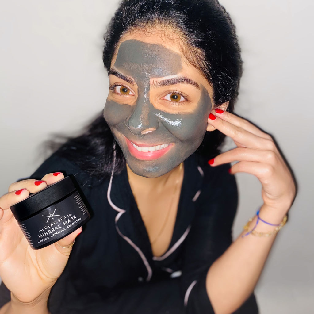 Woman holding luxurious Dead Sea Face Mask