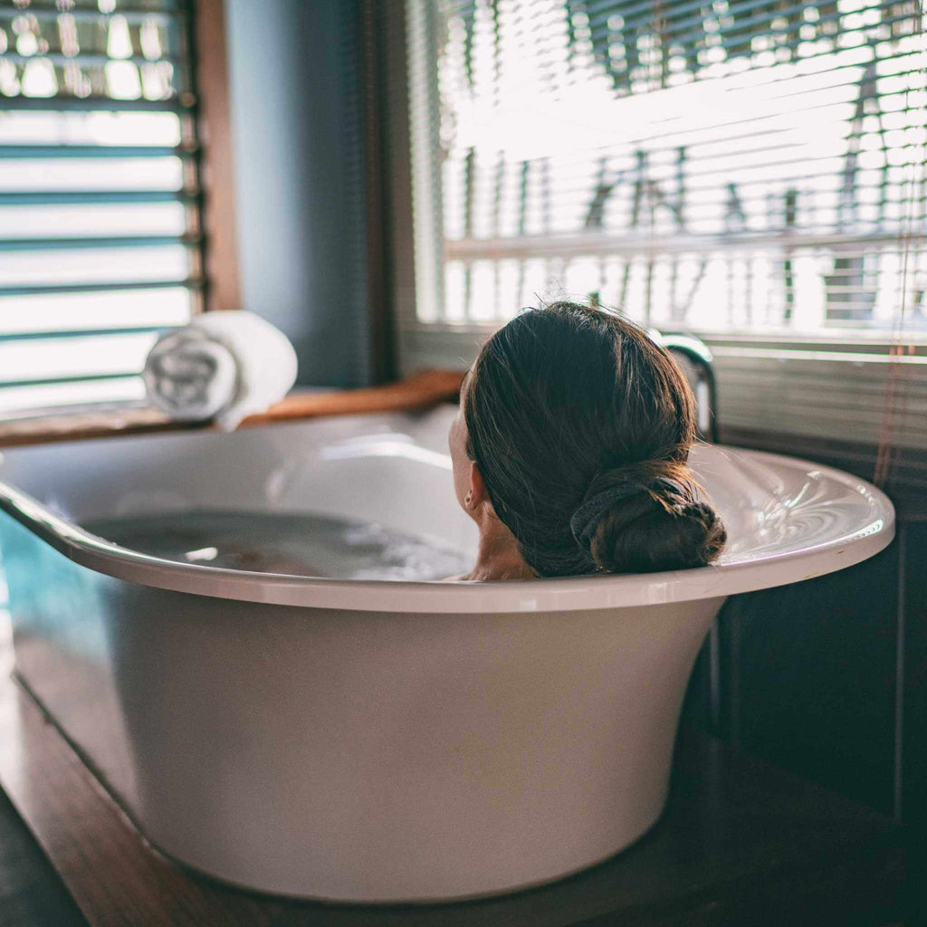 Women taking a bath as part of her wind down time