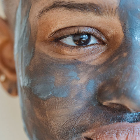 Woman using a Dead Sea mud mask