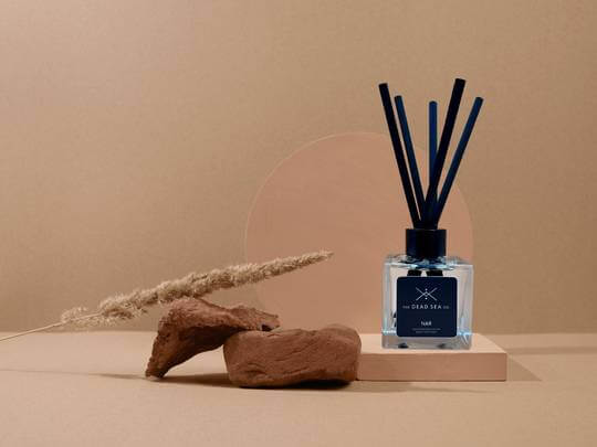 Nar Reed Diffuser 100ml bottle with black fibre reeds, featuring a rich blend of smoky woods, Mirabelle plum, tobacco, and leather.