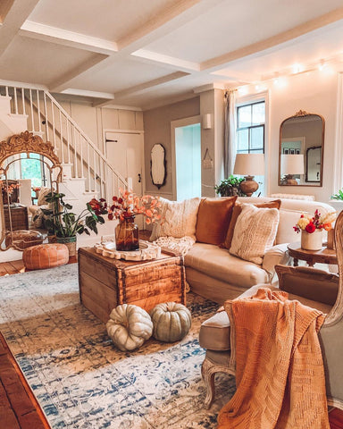 cozy autumn living room with orange decor