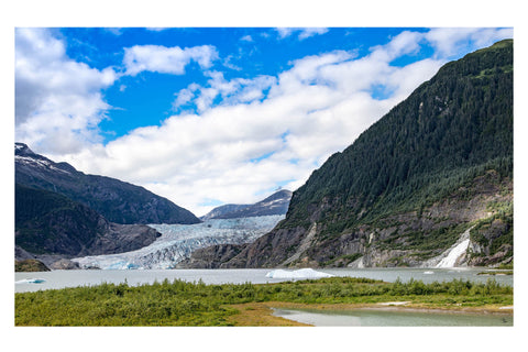 Mendenhall glacier alaska showing waterfall lake glacier and eagles flying