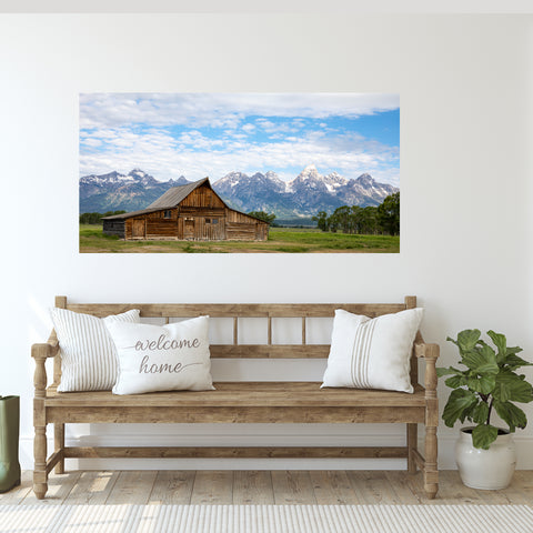 TA Moulton barn photography hanging on wall above farmhouse style bench