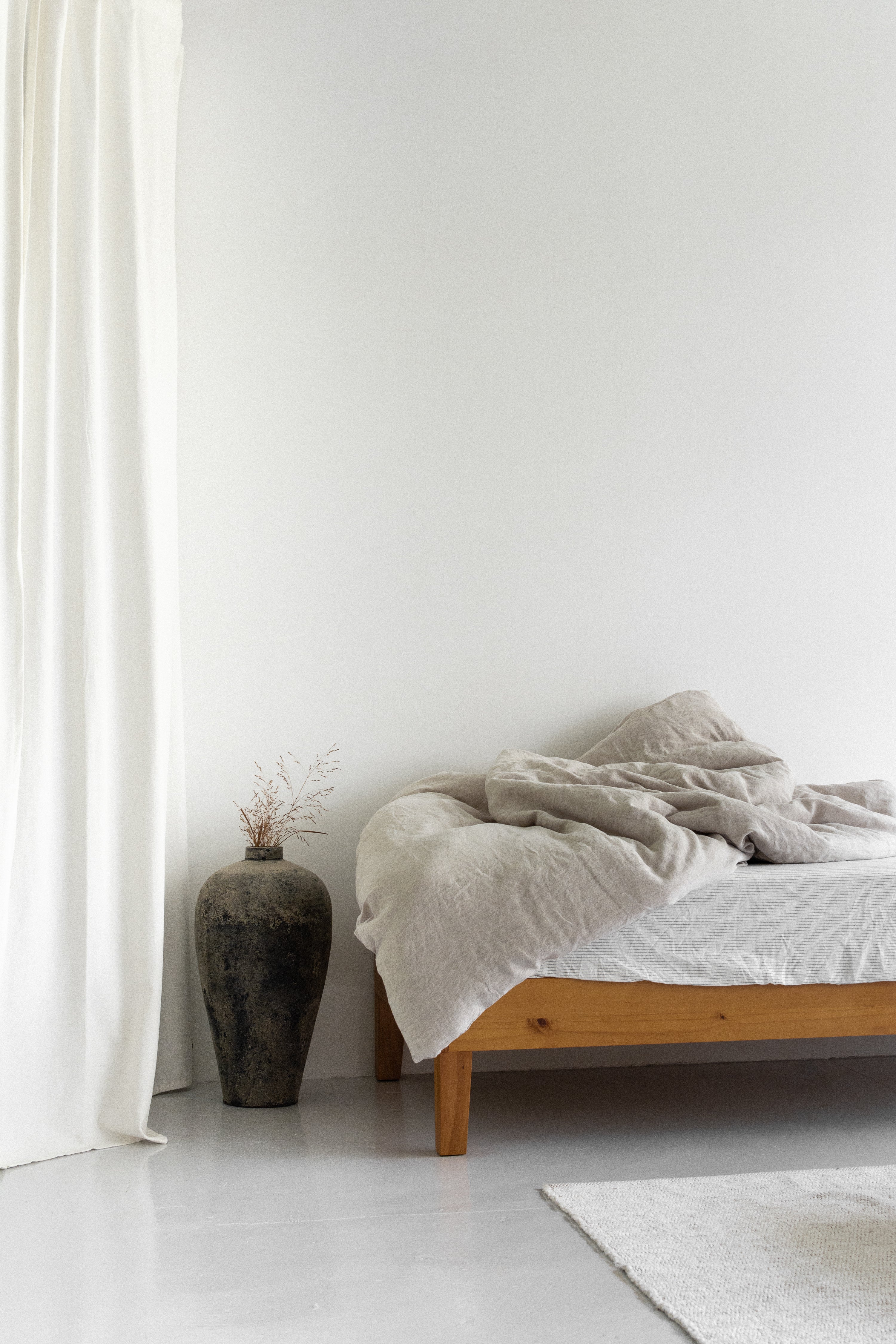 Linen bedding on bed with a relaxed look