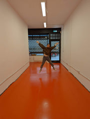 The finished floor in bright orange