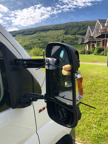 Motorhome mirror that's taken a hit from a Transit van.