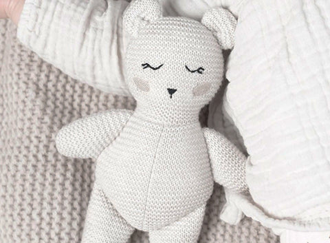Polar bear baby cuddly toy by Baby Bello