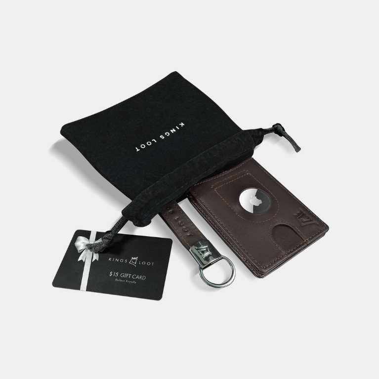 A brown leather wallet, keychain, and a $15 gift card on a white surface.