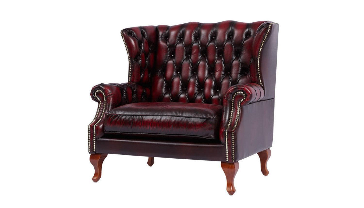 Oxblood antique leather high back wing chair