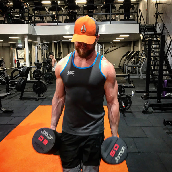 Ben Coomber gym training with dumbbells