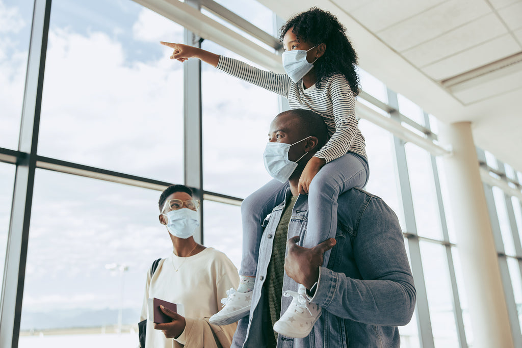 African family at airport during the pandemic