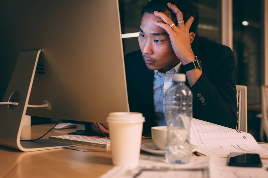 Man stressed out at work