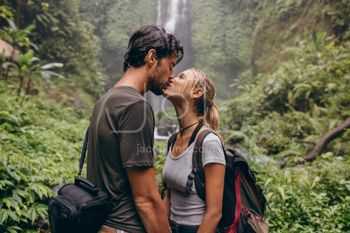 Couple In Love Kissing Near A Waterfall In Forest Jacob Lund Photography Store Premium Stock 5151