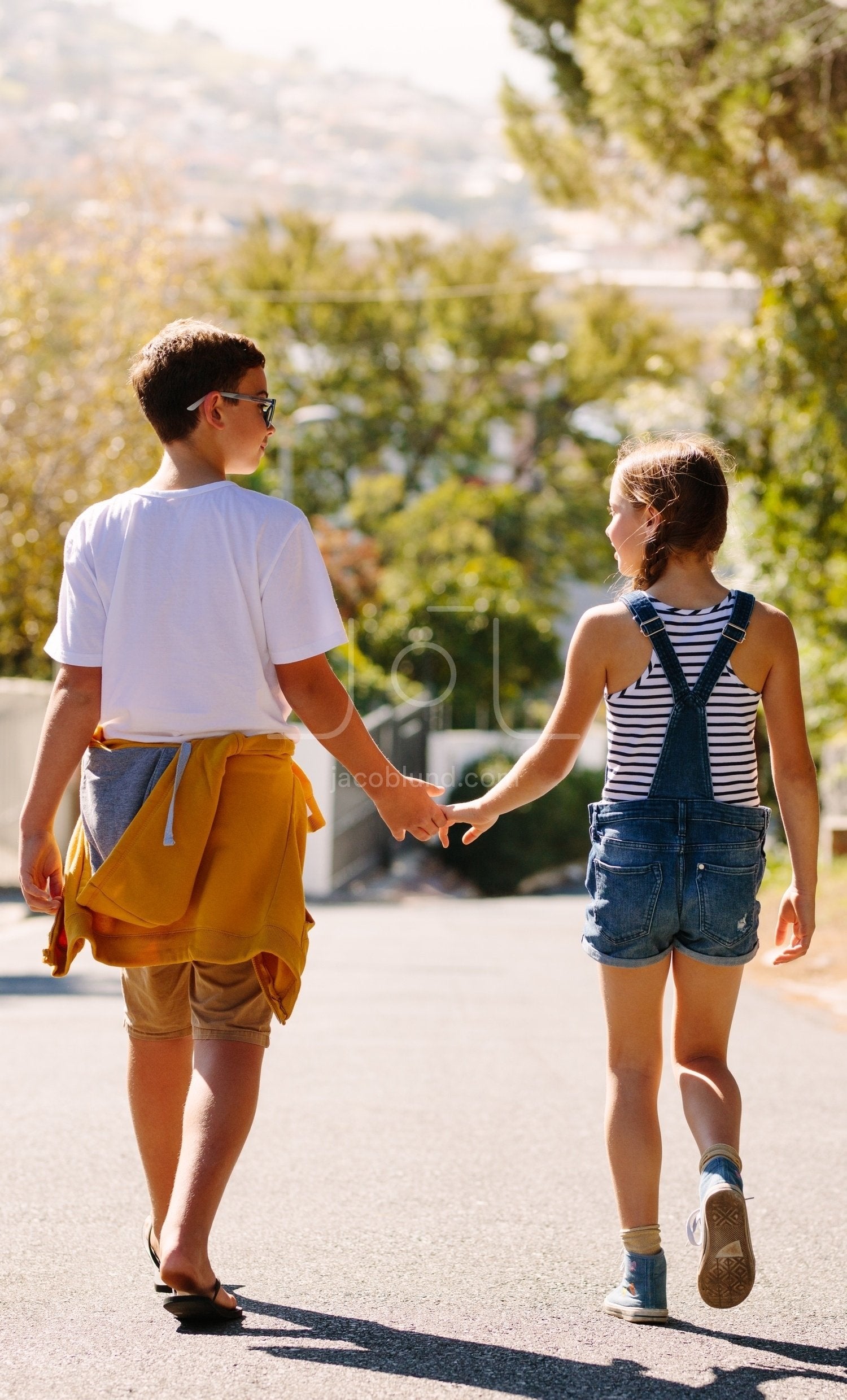 Boy And Girl In Love Walking On Street Holding Hands Jacob Lund Photography Store Premium Stock Photo