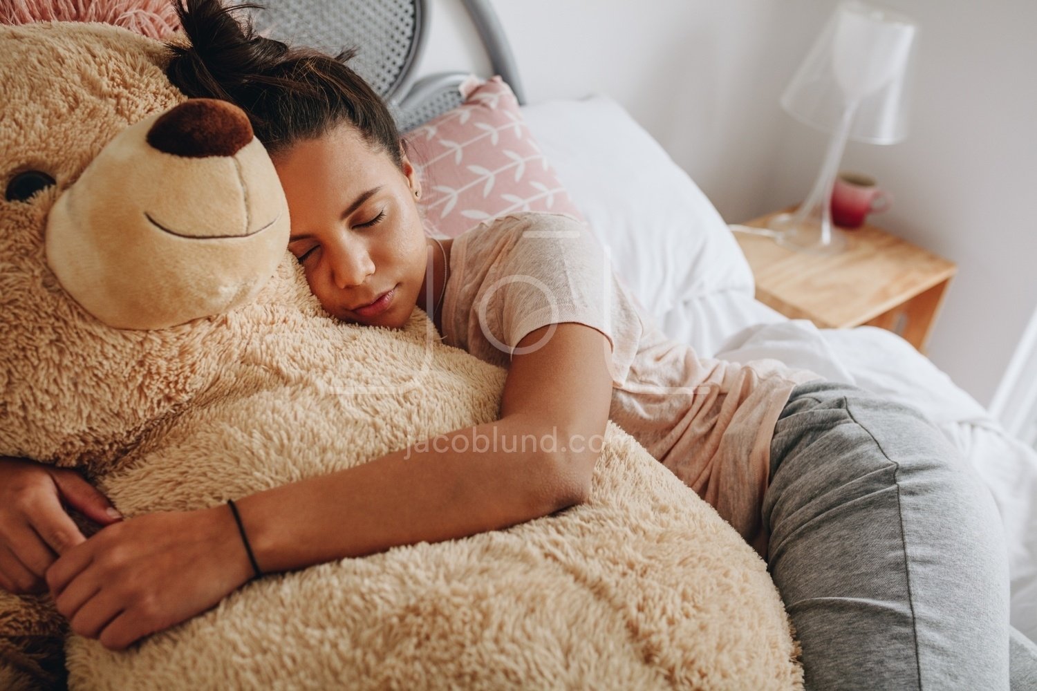 bed with teddy bear