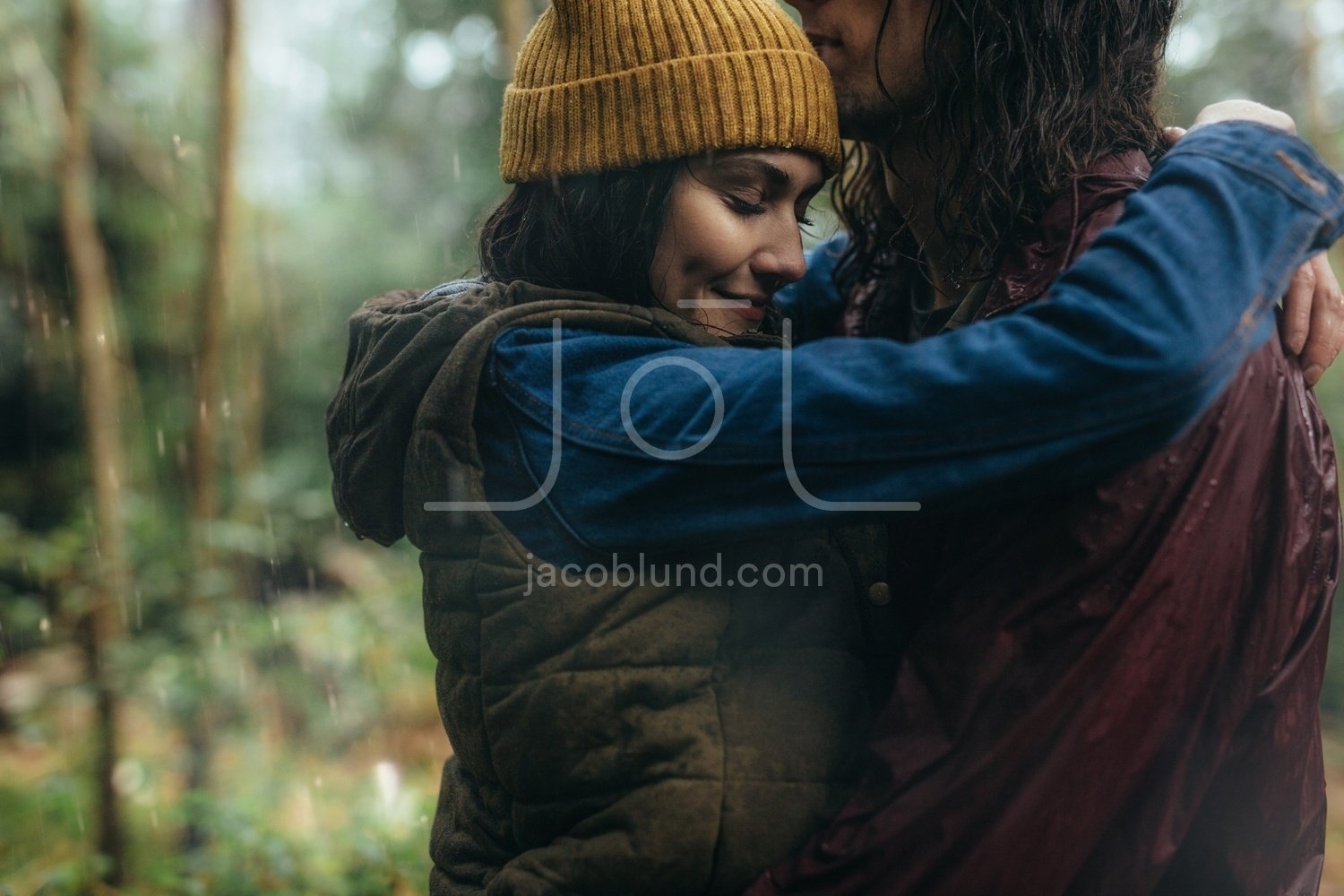 couple hugging in the rain