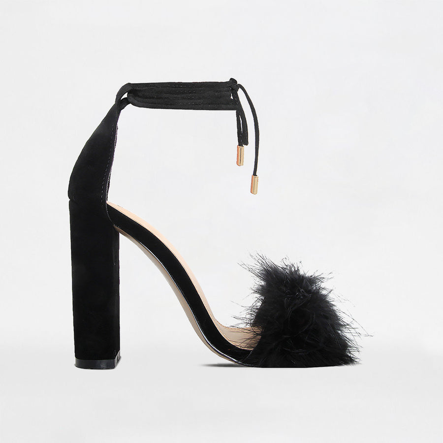 black heels with fluffy front