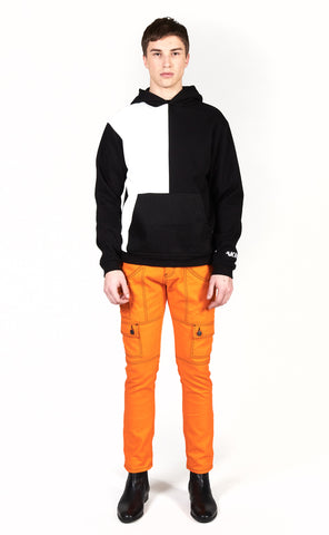 Orange denim with a Split-tone black and white denim hoodie with kangaroo pockets 