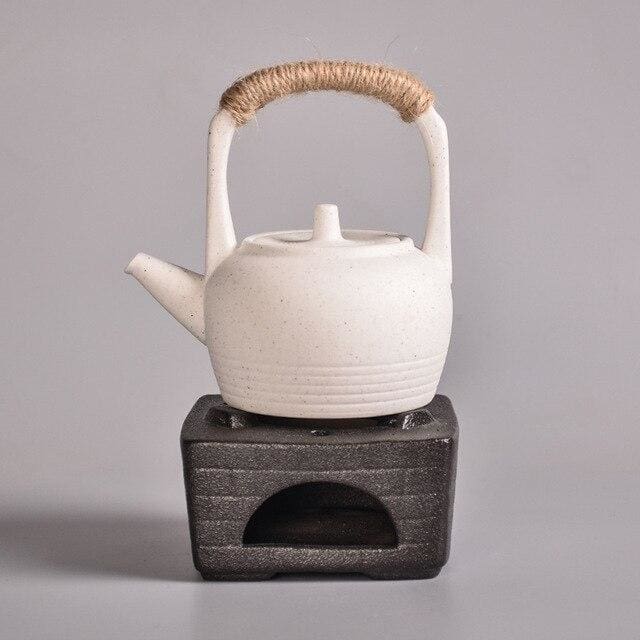 https://cdn.shopify.com/s/files/1/0059/2887/8191/products/teapot-with-warm-stove-koana-style-e-tea-pots-pot-my-japanese-home_168.jpg?v=1560019089