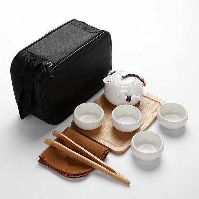 https://cdn.shopify.com/s/files/1/0059/2887/8191/products/travel-tea-set-miyakejima-4-cup-with-accessory-1-sets-my-japanese-home_715.jpg?v=1553026942