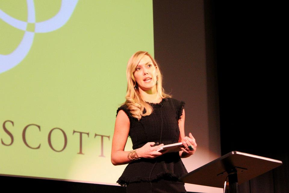 Kendra Scott speaking at conference.