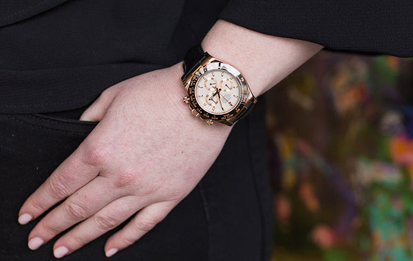 Woman wearing a Rolex Daytona