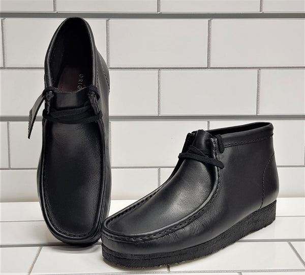 black wallabee boots