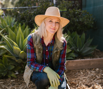 woman gardening and wearing protective clothing