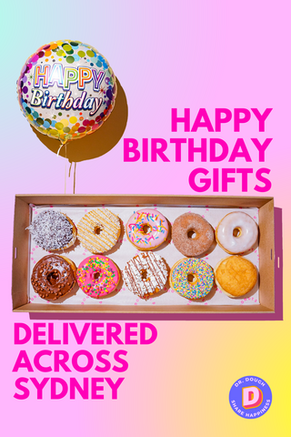Classic Dr. Dough Donut range box with 10 delicious donuts and a Happy Birthday foil helium filled balloon attached to the box.