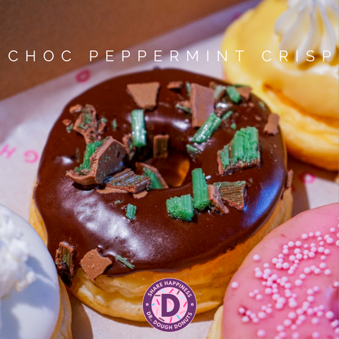 Our Peppermint Crisp Donut that is part of the Backyard Favourite Flavours box and is topped with chocolate glaze with peppermint crisp chocolate pieces.