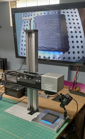 An Endurance DIY marking machine with 4 / 10 / 30 / 50 watt DPSS / Fiber (Raycus) laser modules with a Sino Galvo head.