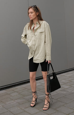 Tess Pelka wearing Jiyo Black Bag, Jeenaa Bags