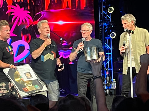 MTV VJs Mark Goodman and Alan Hunter with St Elmos Fire RIAA award at The Sands