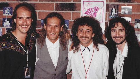 Photo of Michael Bolton with Jerry Blair, Louis Levin and Joe Schuld