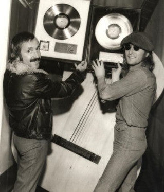 Al Coury with John Lennon and RIAA award