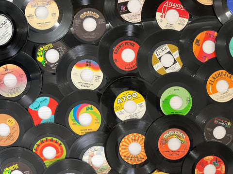 array of 45 vinyl record designs
