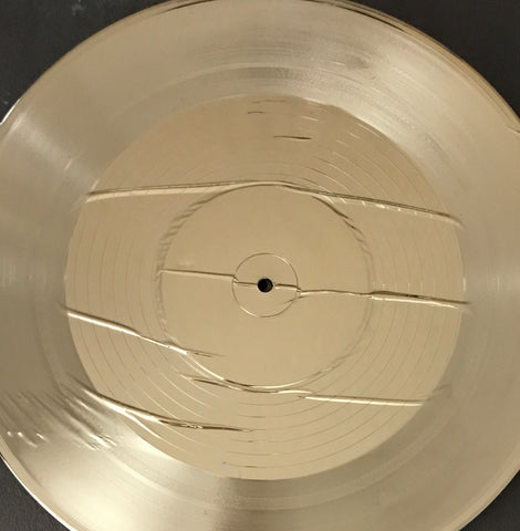 damaged plastic record award disc